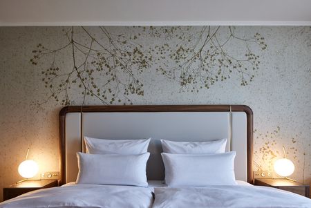 Bett im Parkhotel Hotelzimmer